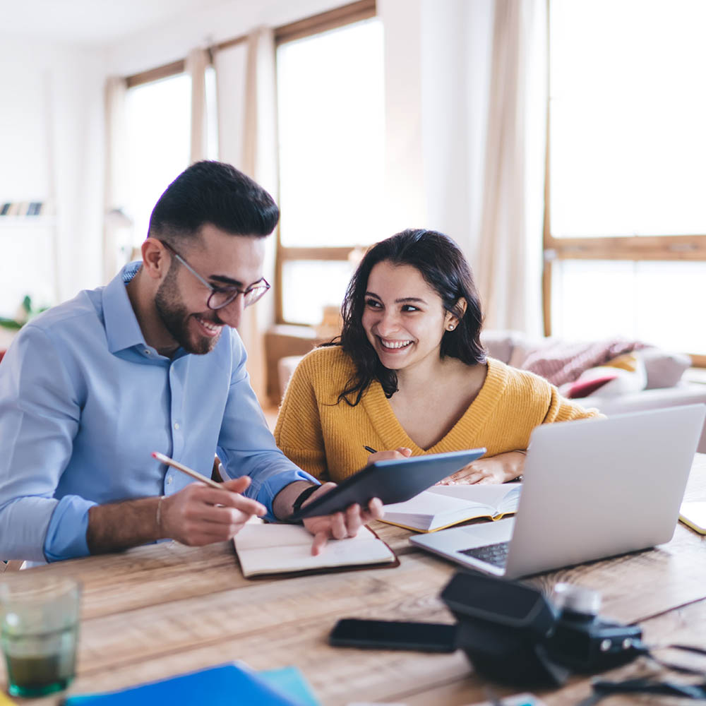 Couple looking at computer.